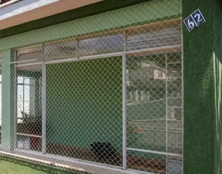 Acabamento profissional de rede de proteção em sacada